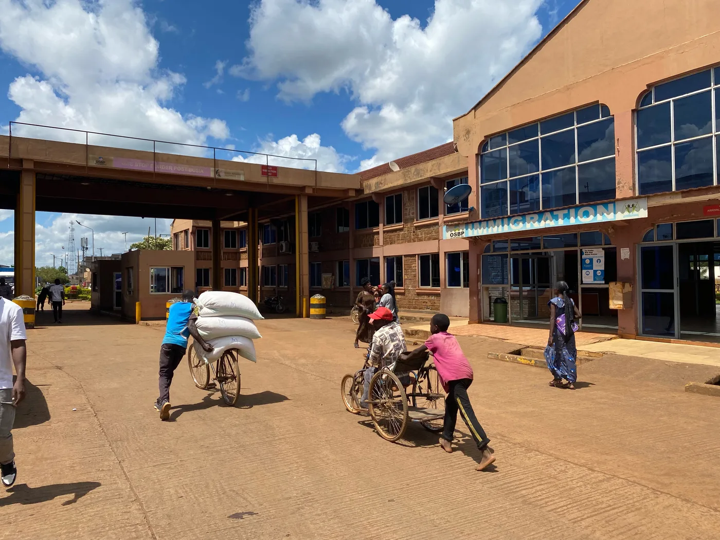 Traders crossing the Busia one-stop border post between Kenya and Uganda, goods loaded on bicycles